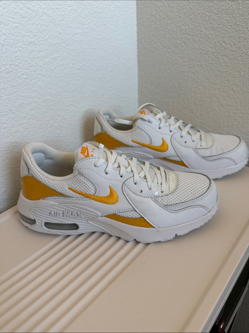 Nike Excee White & Gold Casual Sneakers.